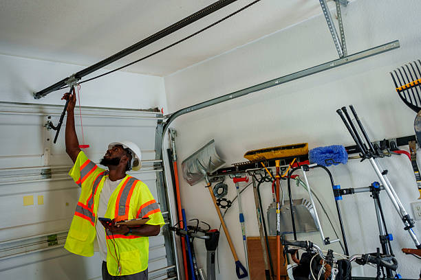 Professional Garage Door Panel Replacement technician working in New Eagle, PA